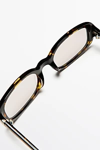 Oval tortoiseshell-effect sunglasses