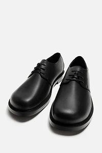 CHAUSSURES HABILLÉES