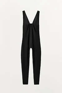 COMBINAISON À BRETELLES AVEC POLYAMIDE ET ZIP