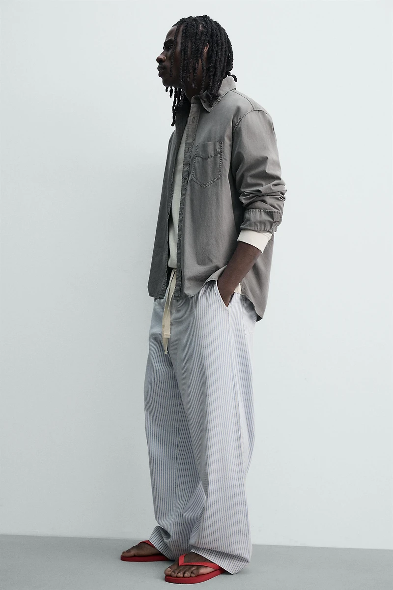 STRIPED BAGGY FIT PANTS