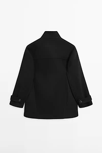 Wool blend high neck coat with button fastening