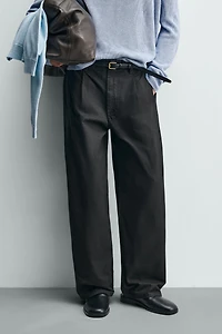 WIDE FIT PLEATED PANTS