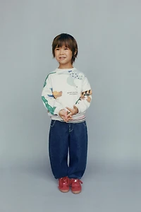 DINOSAUR PRINT SWEATSHIRT