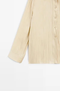 Flowing satin shirt with tie detail