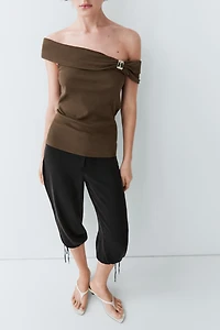 Off-the-shoulder top with jewel detail