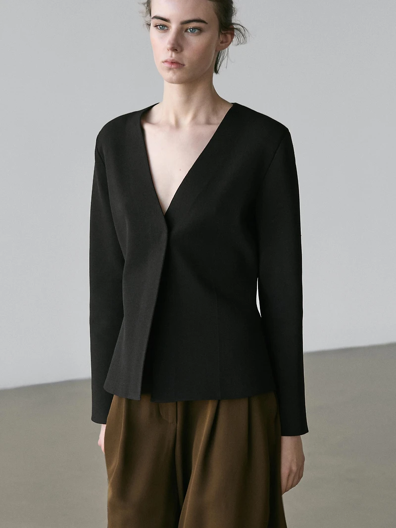 Blazer en maille à col V et fermeture