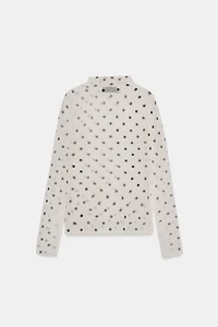 TOP EN MAILLE SEMI-TRANSPARENTE À POIS