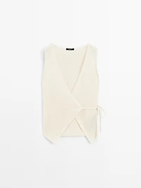 Knit crossover waistcoat with drawstring