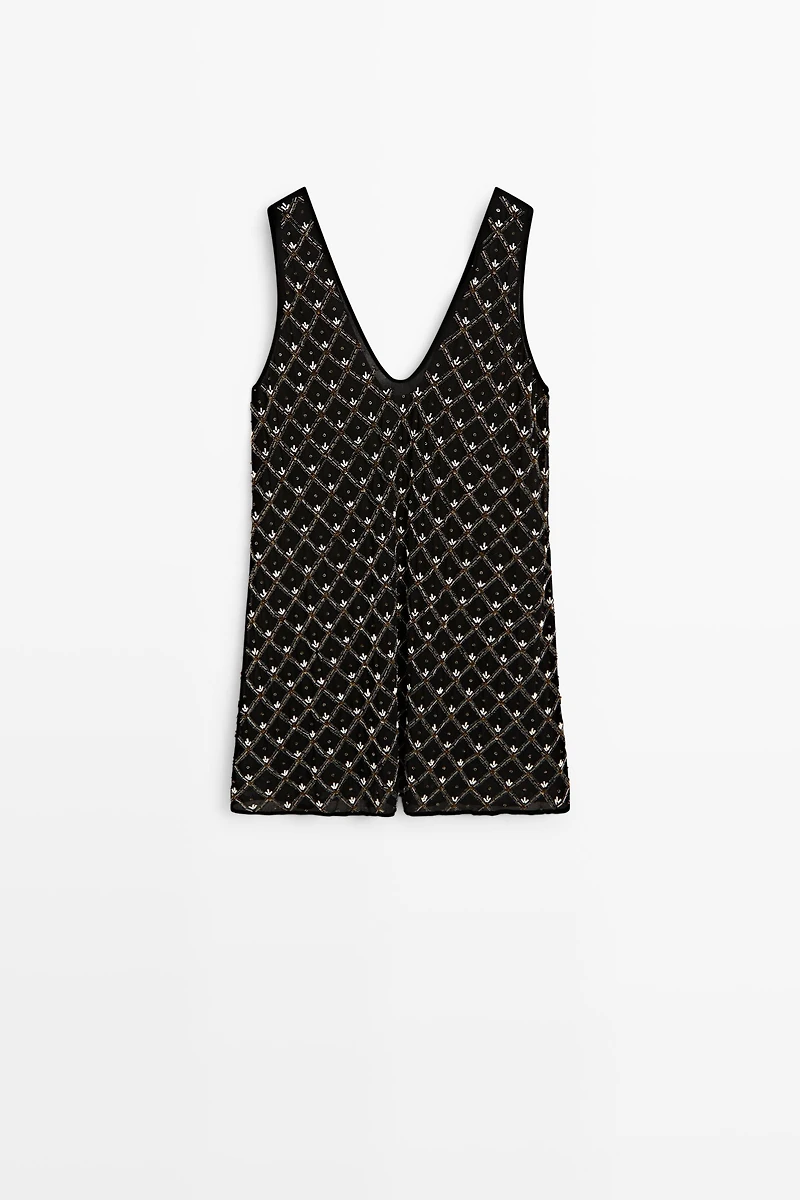 Robe courte à détails de perles