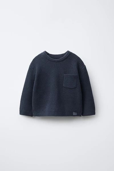 PULL EN MAILLE PERLÉE AVEC POCHE