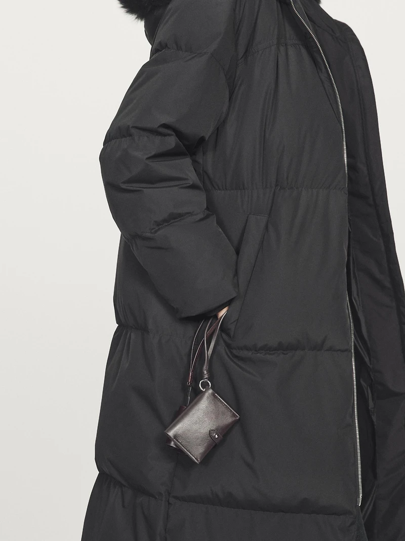 Doudoune technique avec capuche en fourrure