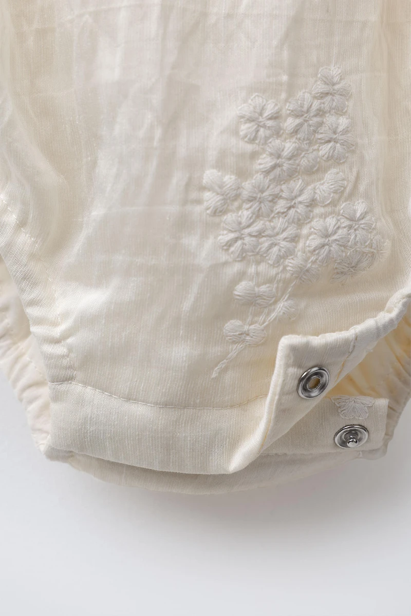 EMBROIDERED FLORAL ROMPER