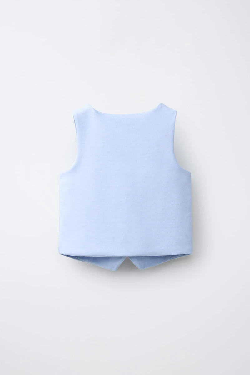 GILET BOUTON BIJOU