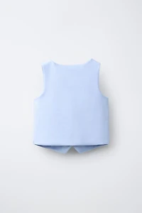 GILET BOUTON BIJOU