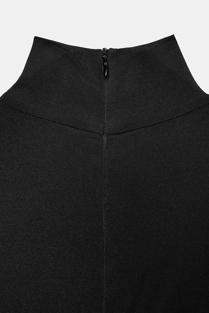 LONG COMBINATION VOLUME JUMPSUIT