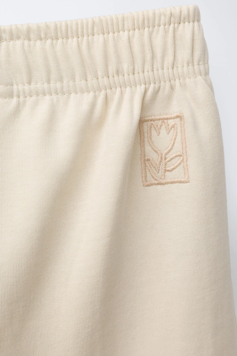 PANTALON À JAMBES LARGES