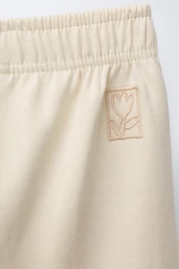 PANTALON À JAMBES LARGES