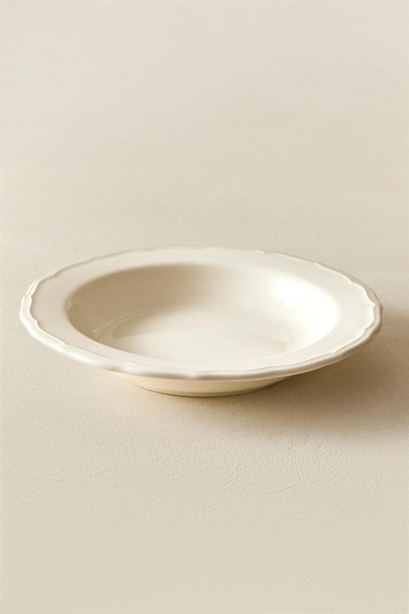 EARTHENWARE SOUP PLATE WITH RAISED-DESIGN EDGE