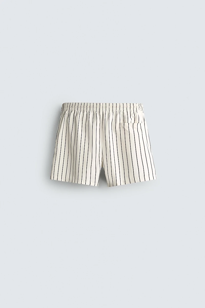 STRIPED MID-LENGTH SWIM TRUNKS