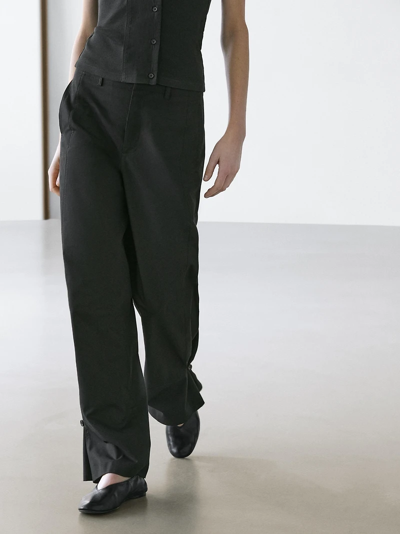 Cotton blend trousers with hem detail