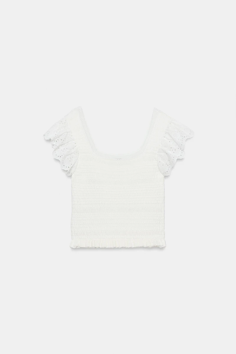 EMBROIDERED EYELET KNIT TOP