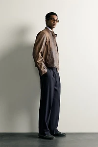 RELAXED FIT PLEATED PANTS