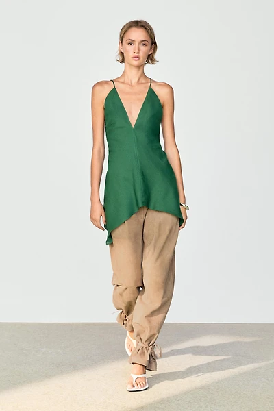 Asymmetric spaghetti strap top