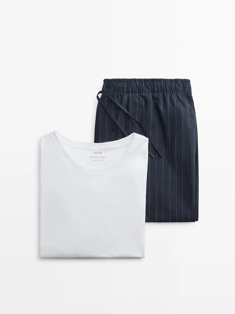 Short sleeve pyjama top and striped trousers