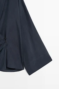 Flowing gathered wrap blouse