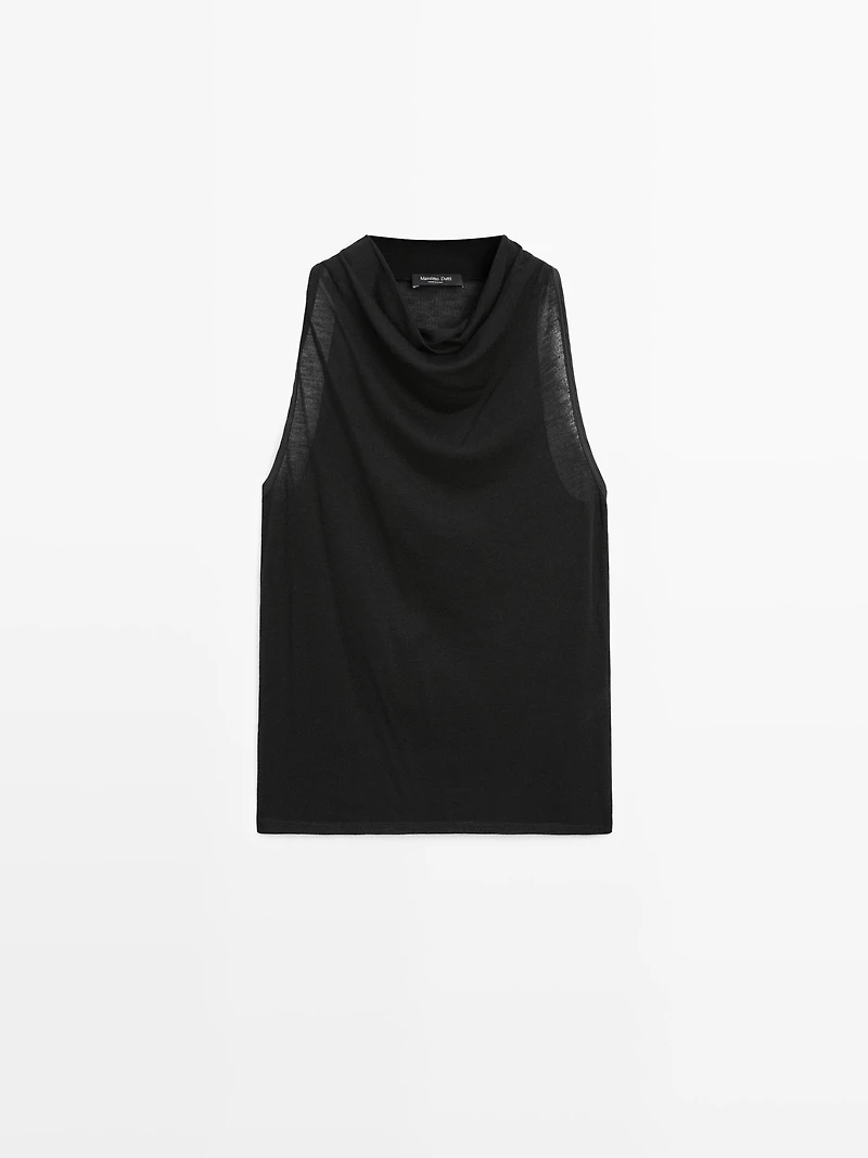 Sleeveless top with draped neckline