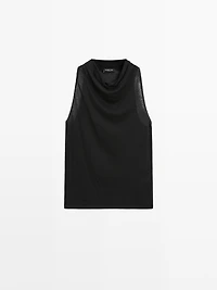 Sleeveless top with draped neckline