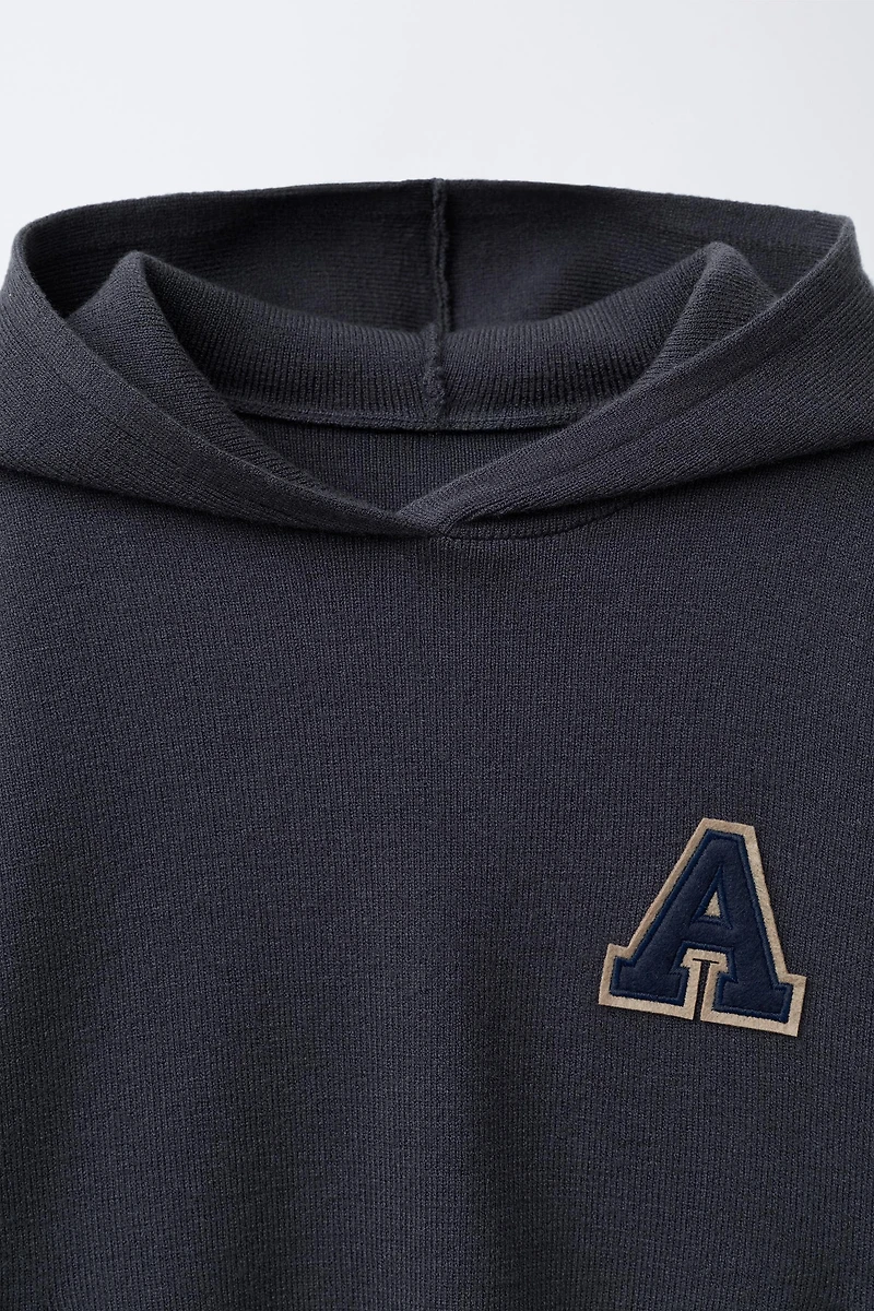 KNIT JUMPER WITH LETTER PATCH