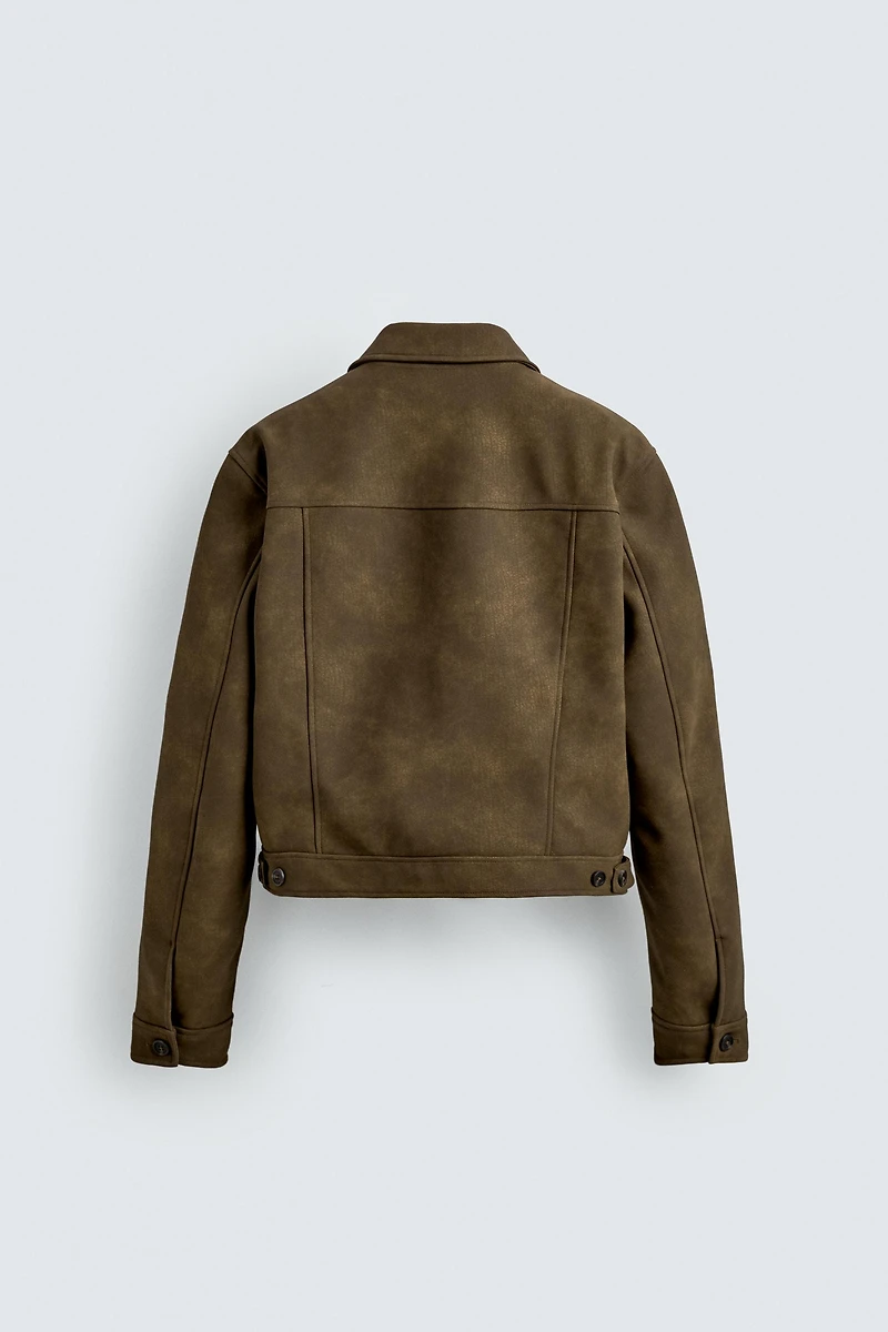 BLOUSON COURT EN MATIÈRE SYNTHÉTIQUE