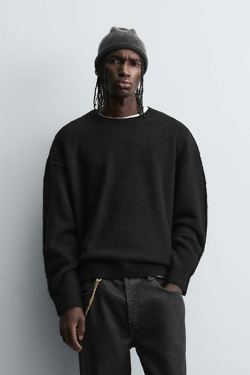 PULL TEXTURÉ COUTURES EFFET INVERSÉ