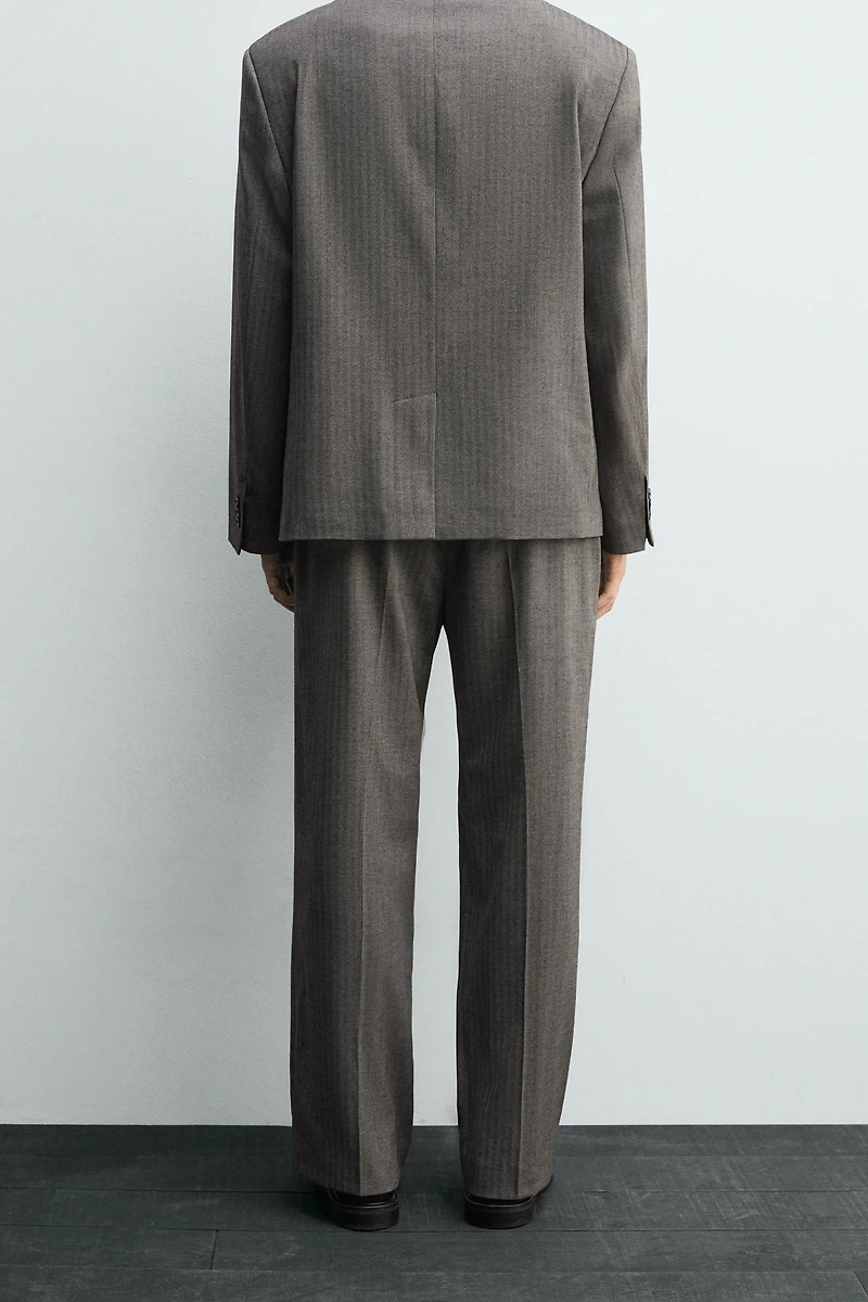 PANTALON ÉVASÉ DE COSTUME À CHEVRONS