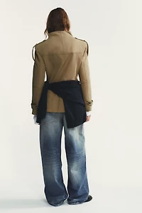 VESTE À POCHES ET PATTES