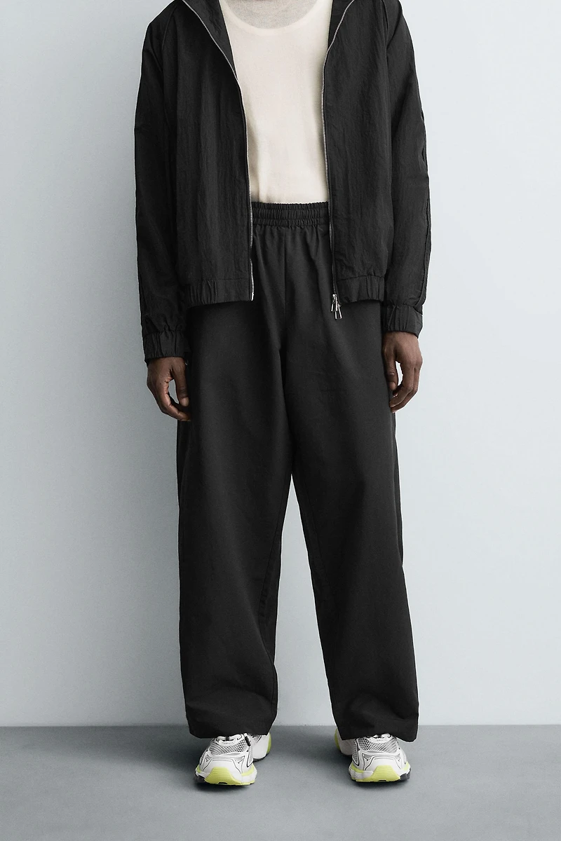 TECHNICAL PANTS WITH STRIPES