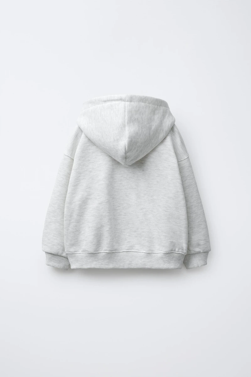 SWEAT ZIPPÉ IMPRIMÉ CŒUR