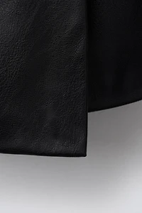 FAUX LEATHER BOW SKORT
