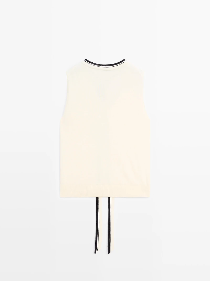 Knit vest with tie detail