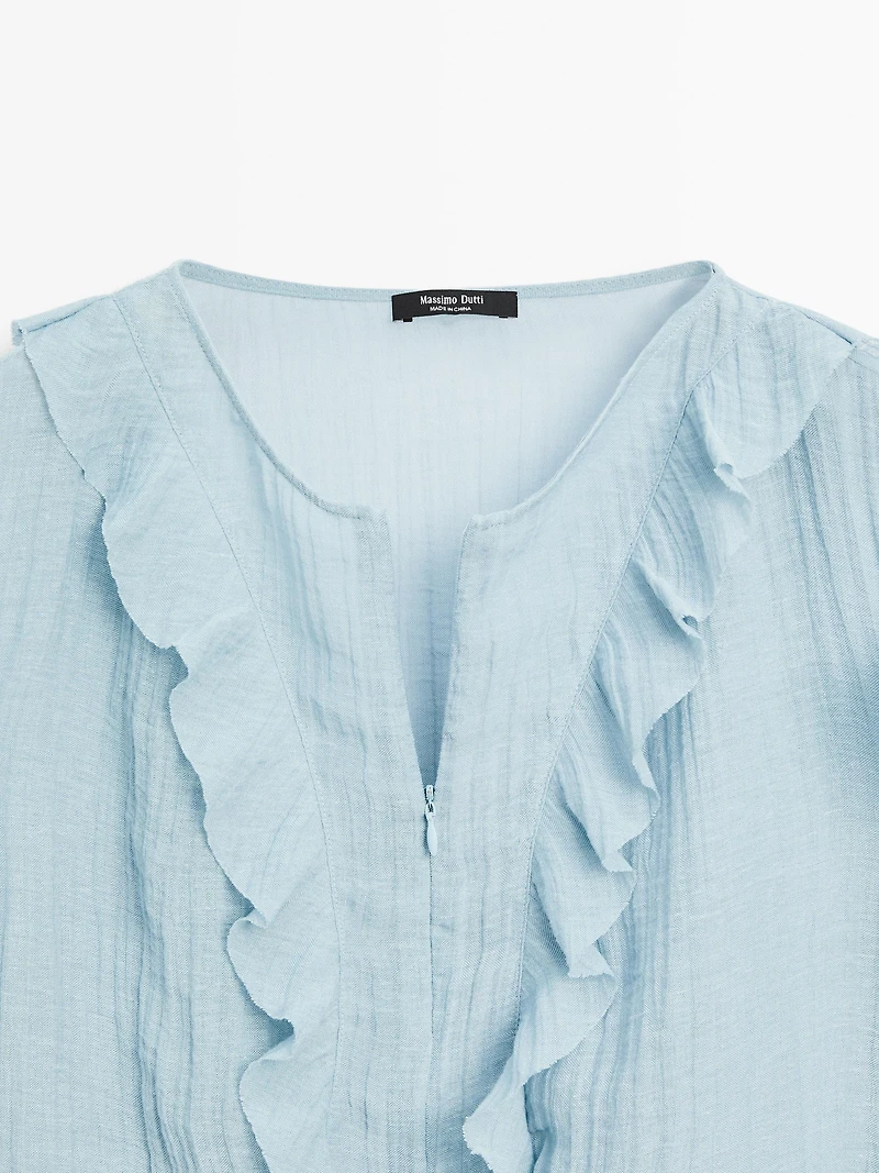 Flowing blouse with ruffles