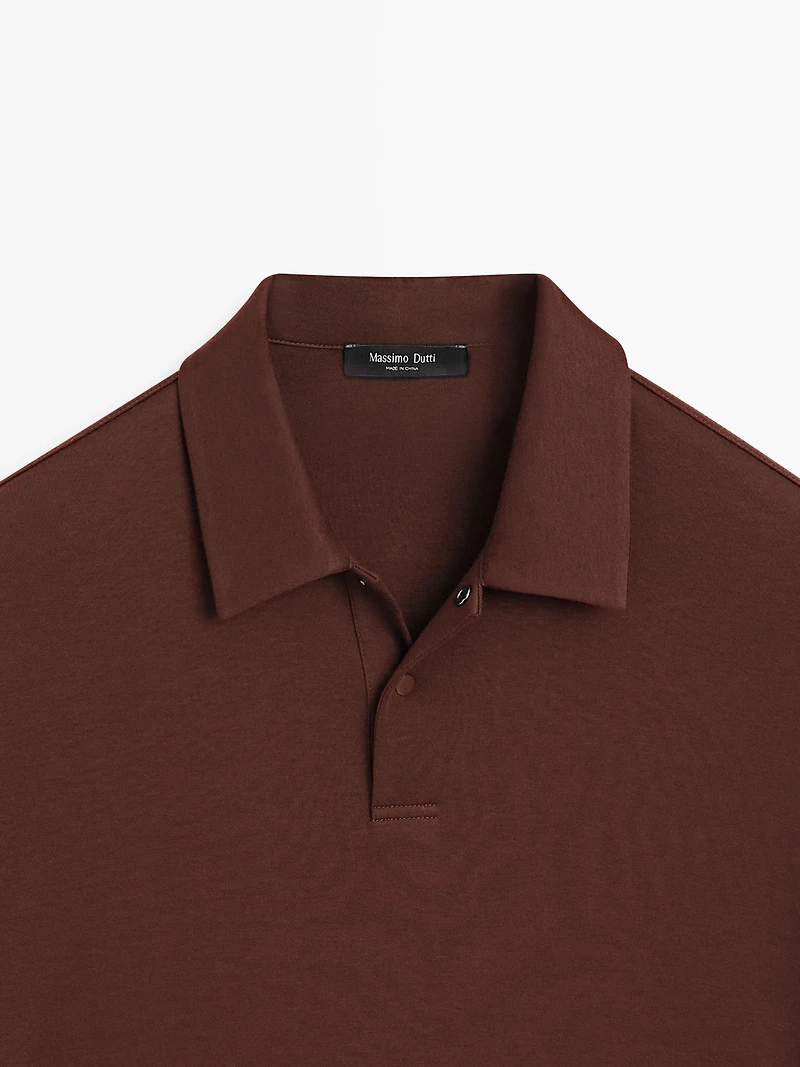 Long sleeve polo shirt with snap button