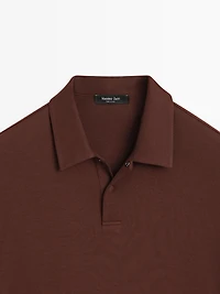 Long sleeve polo shirt with snap button