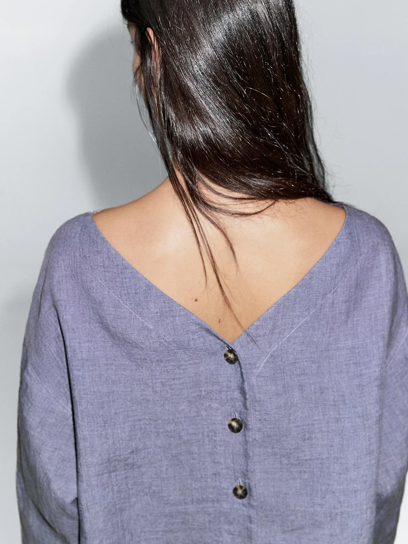 V-neck blouse with sleeve detail