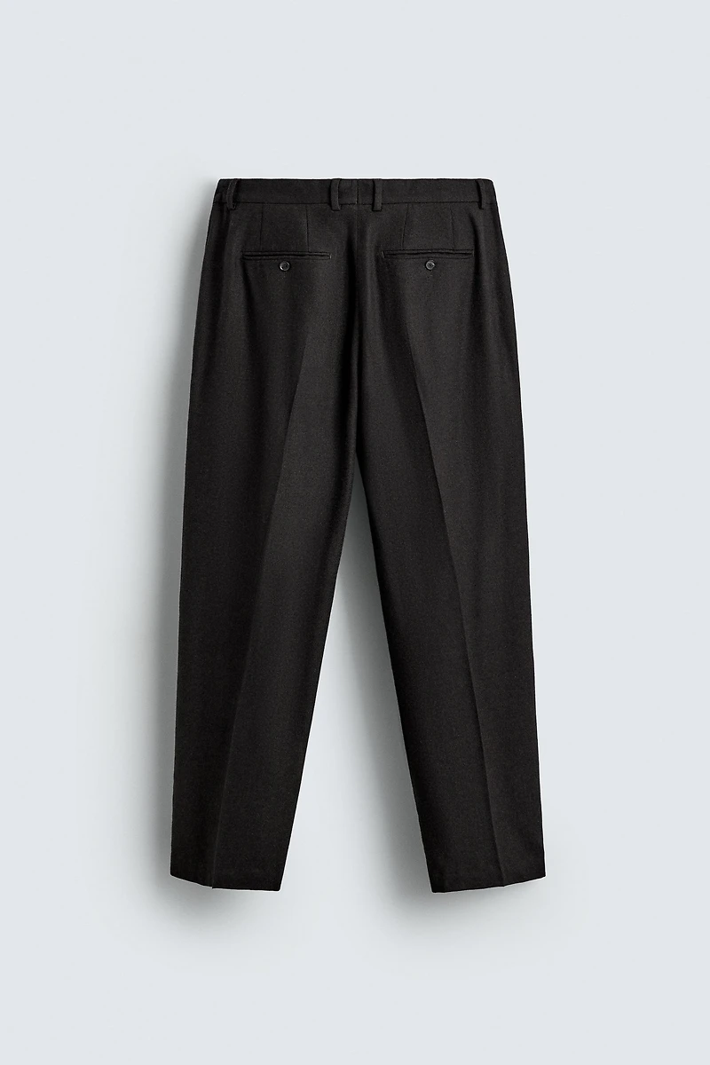 LIMITED EDITION PLEATED WOOL PANTS