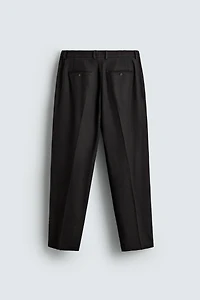LIMITED EDITION PLEATED WOOL PANTS