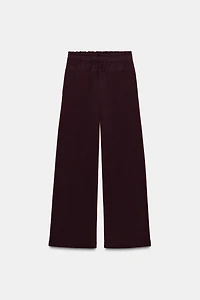 CONTRASTING FABRIC PANTS