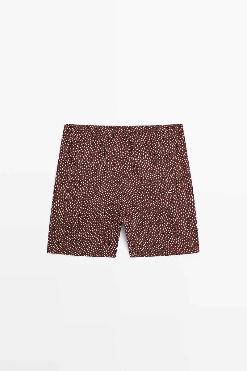 Polka dot print swimming trunks