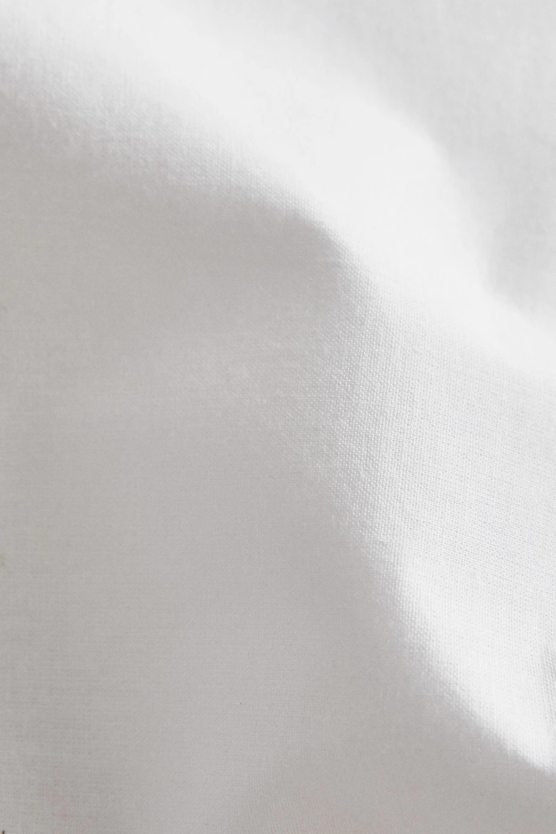 ROUND PLACEMAT WITH RUFFLE