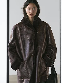 Mouton leather coat with crackled finish